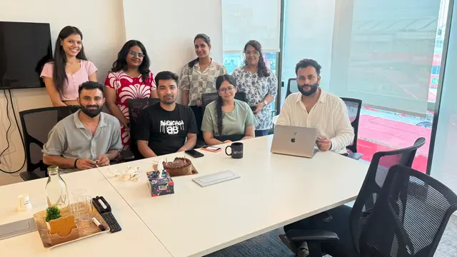 The team around the office meeting table