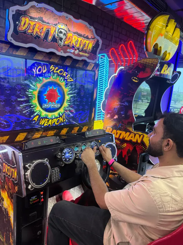 A team member on an arcade racing game