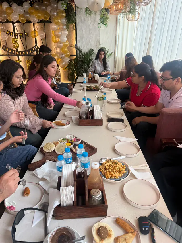 Food and conversation at the anniversary lunch