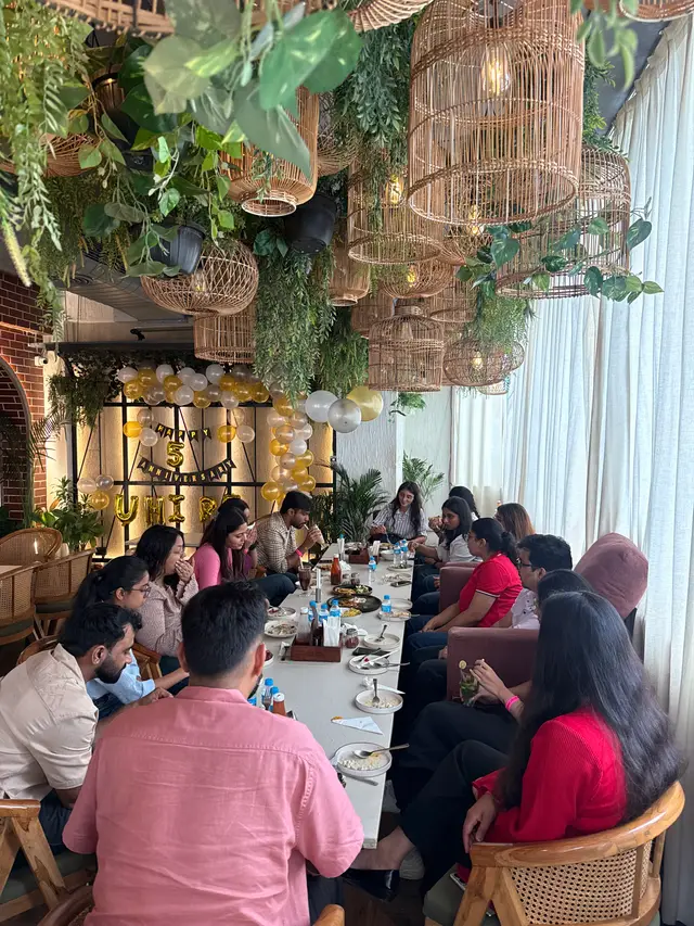 Team members chatting over lunch